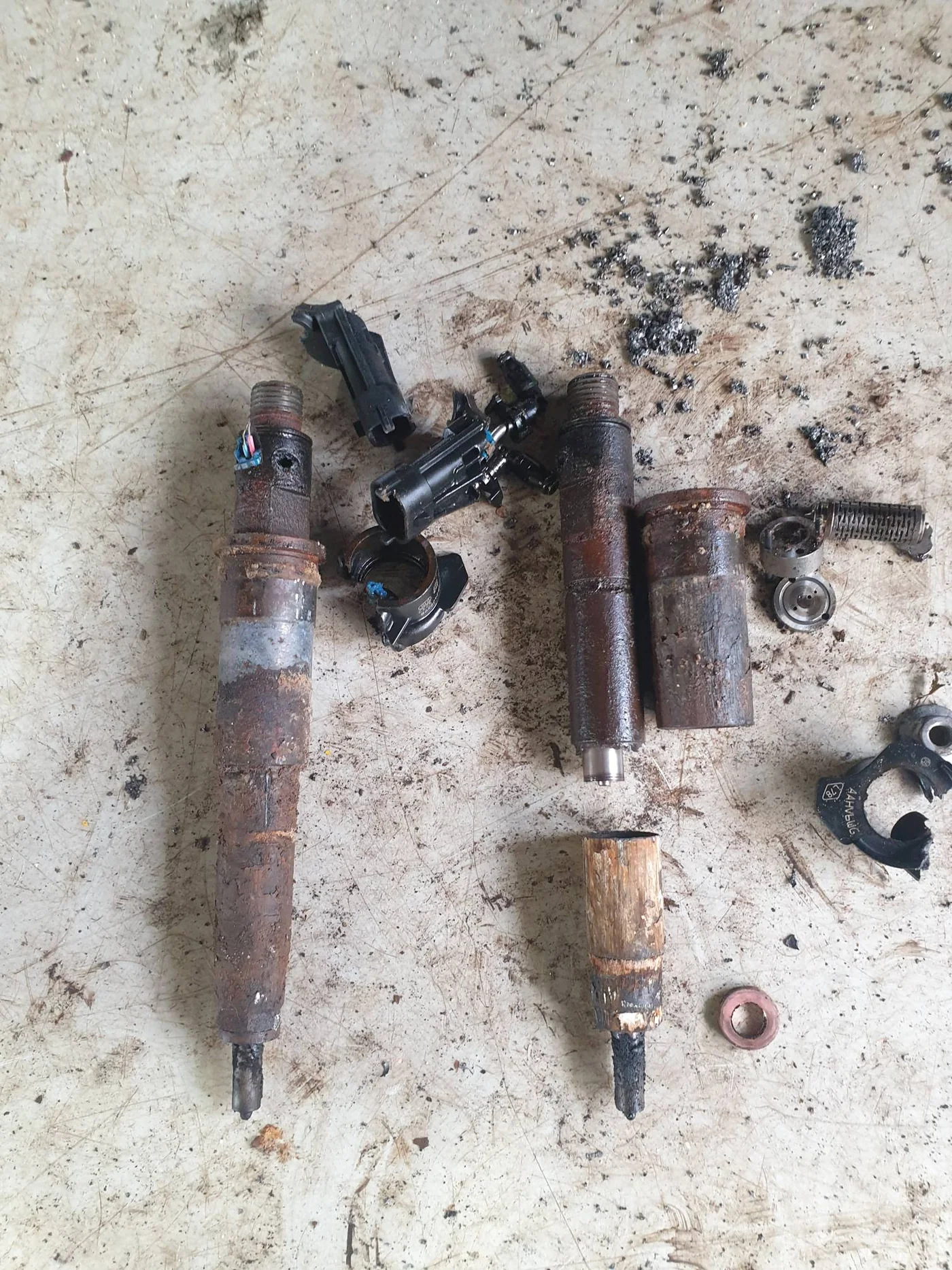 Corroded Renault Trafic 2.0 litre M9R diesel injectors after removal
